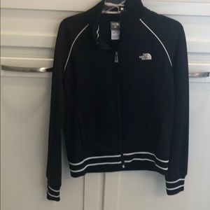 Woman's North Face zip up jacket . Sz Large